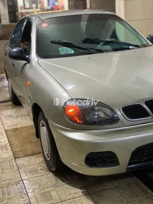 دايو لانوس 1999 ذهبي مستعملة للبيع - 8