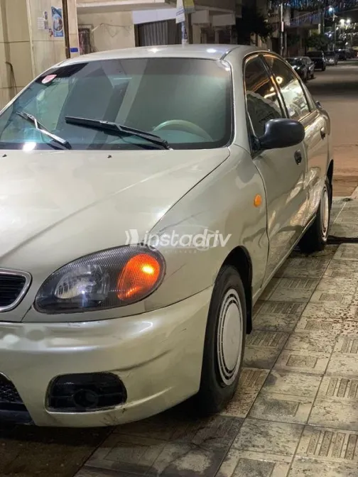 دايو لانوس 1999 ذهبي مستعملة للبيع - 10