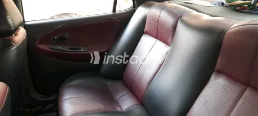 هيونداي إلنترا 1995 أبيض مستعملة للبيع - 9