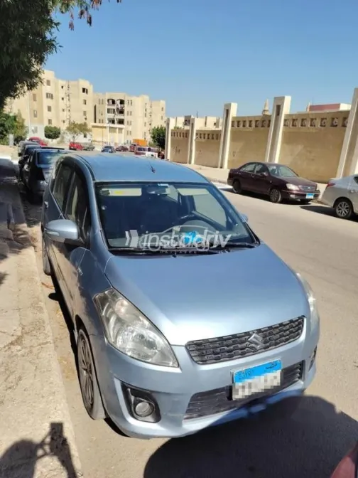 سوزوكى ارتيجا 2015 أبيض مستعملة للبيع - 7