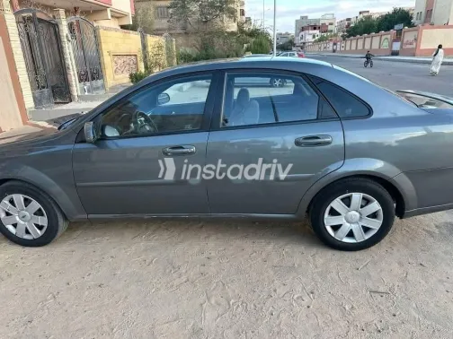 شيفروليه أوبترا 2012 رمادي مستعملة للبيع - 3