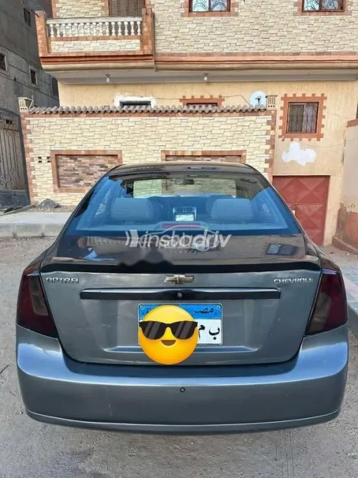 شيفروليه أوبترا 2012 رمادي مستعملة للبيع - 5