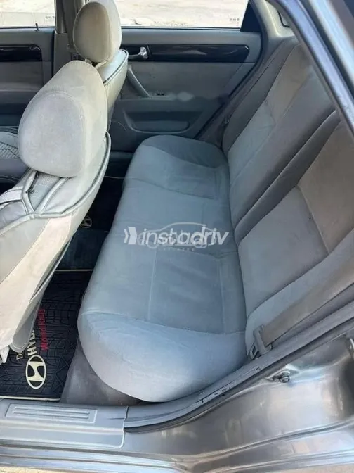 شيفروليه أوبترا 2012 رمادي مستعملة للبيع - 6