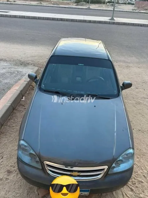 شيفروليه أوبترا 2012 رمادي مستعملة للبيع - 7