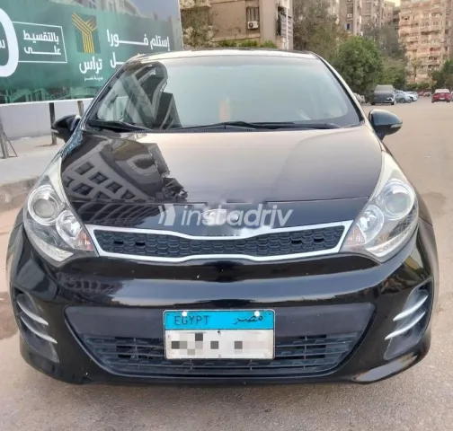 كيا ريو 2015 أسود مستعملة للبيع - 1