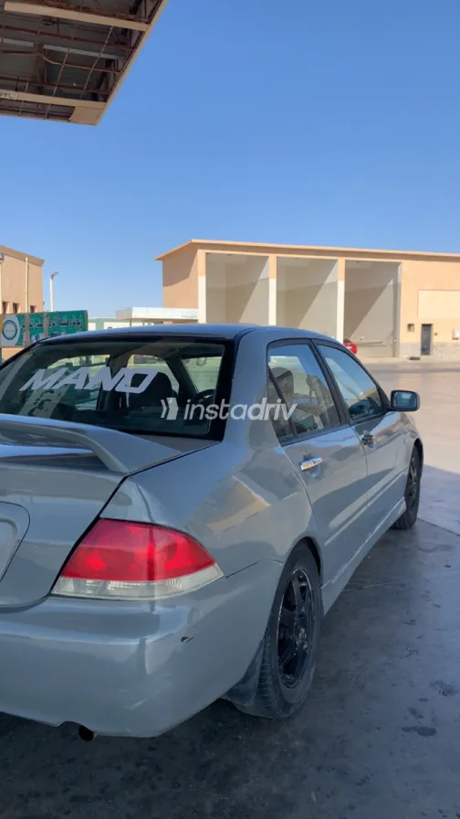 ميتسوبيشي لانسر بومة 2007 أبيض مستعملة للبيع - 1