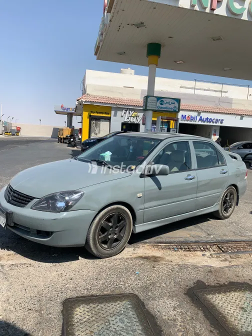 ميتسوبيشي لانسر بومة 2007 أبيض مستعملة للبيع - 2