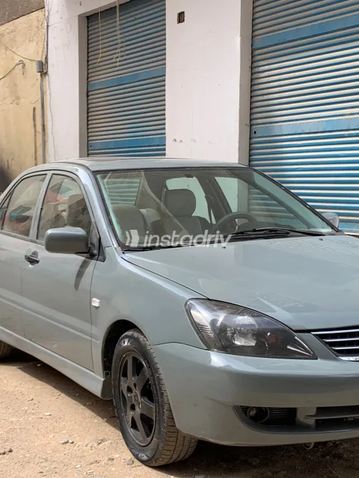 ميتسوبيشي لانسر بومة 2007 أبيض مستعملة للبيع - 3