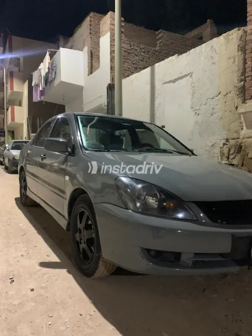 ميتسوبيشي لانسر بومة 2007 أبيض مستعملة للبيع - 4