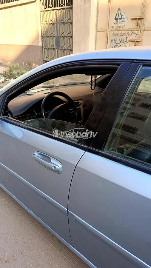 Chevrolet Optra 2010 White Used for Sale - 3