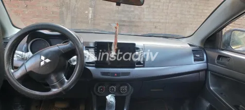 ميتسوبيشي لانسر اى اكس شارك 2015 فضي مستعملة للبيع - 2
