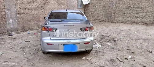 ميتسوبيشي لانسر اى اكس شارك 2015 فضي مستعملة للبيع - 8
