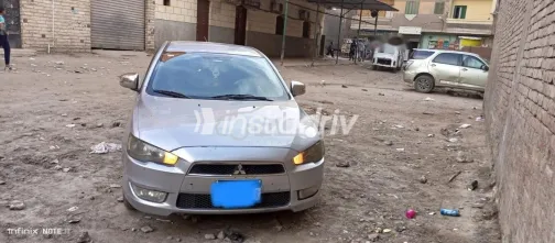ميتسوبيشي لانسر اى اكس شارك 2015 فضي مستعملة للبيع - 10