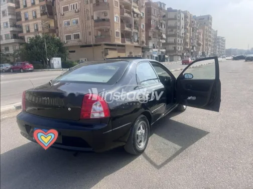 كيا سبكترا 2001 أسود مستعملة للبيع - 4