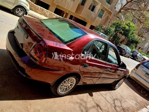 هيونداي فيرنا 2012 أحمر غامق مستعملة للبيع - 1