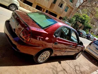 هيونداي فيرنا 2012 أحمر غامق مستعملة للبيع
