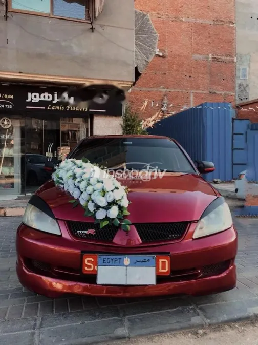 ميتسوبيشي لانسر بومة 2006 أحمر غامق مستعملة للبيع - 2