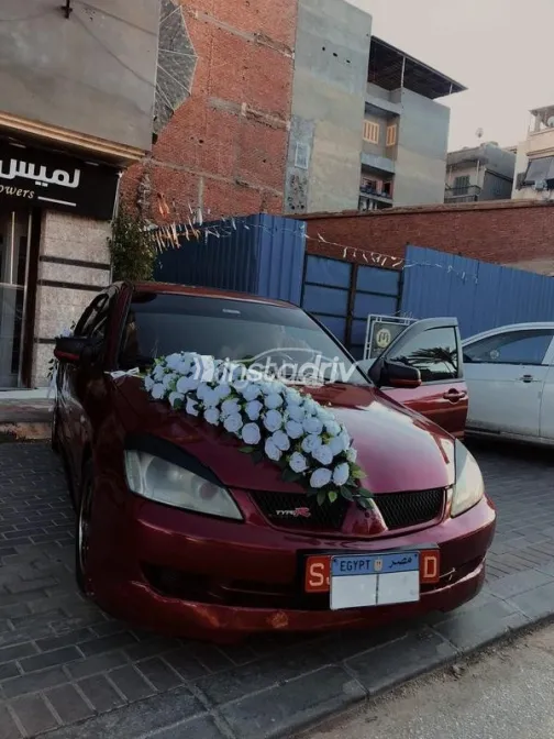 ميتسوبيشي لانسر بومة 2006 أحمر غامق مستعملة للبيع - 6