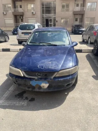 اوبل فيكترا 1999 أزرق غامق مستعملة للبيع