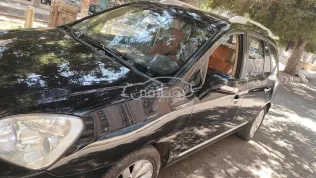 Kia Carens 2011 Black Used for Sale