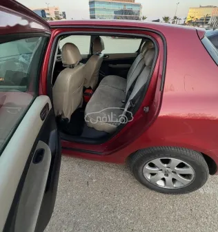 بيجو 307 2007 أحمر غامق مستعملة للبيع