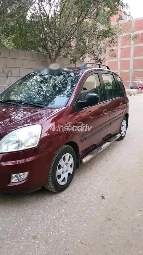 هيونداي ماتريكس 2010 أحمر غامق مستعملة للبيع - 7