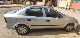 اوبل أسترا 2001 أبيض مستعملة للبيع