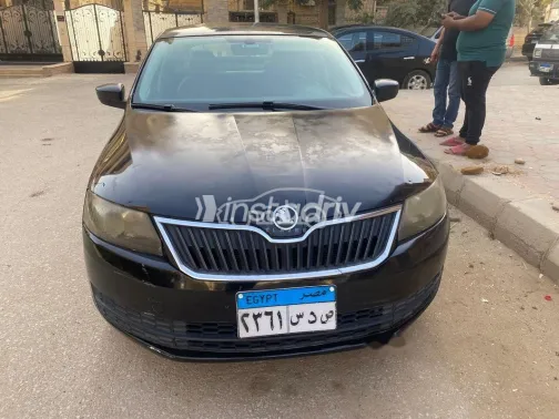 سكودا رابيد 2013 أسود مستعملة للبيع - 1