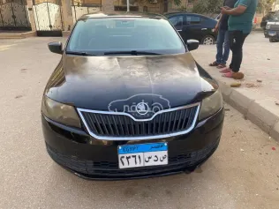سكودا رابيد 2013 أسود مستعملة للبيع