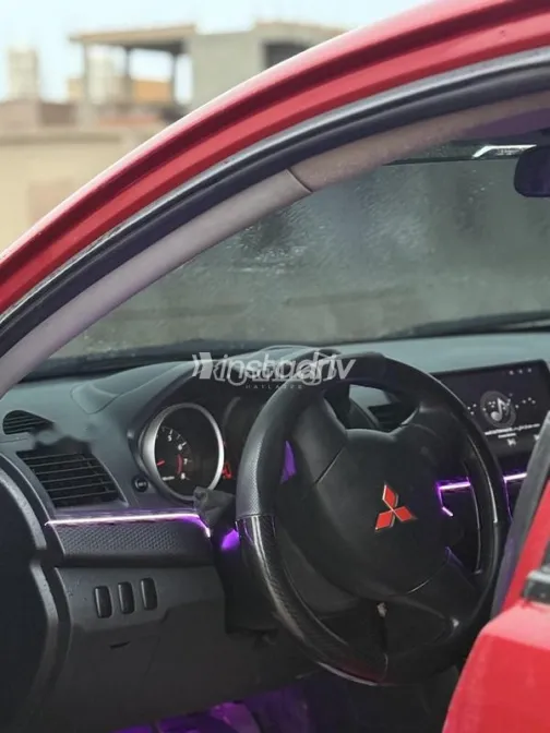 ميتسوبيشي لانسر اى اكس شارك 2015 أحمر غامق مستعملة للبيع - 5