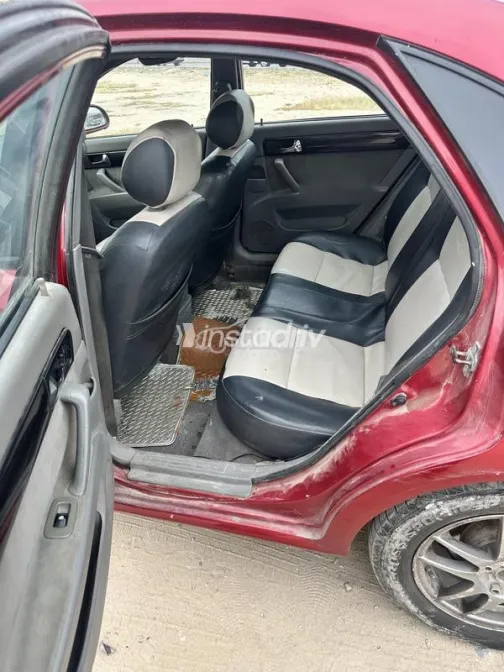 Chevrolet Optra 2011 Red Used for Sale - 7