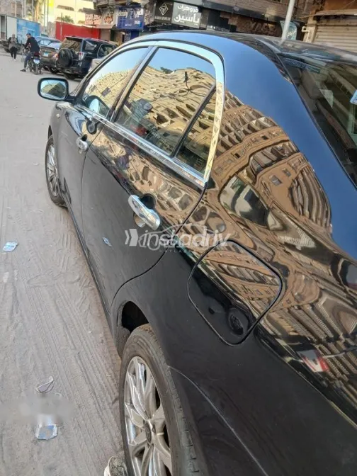 تويوتا كورولا 2013 أسود مستعملة للبيع - 3