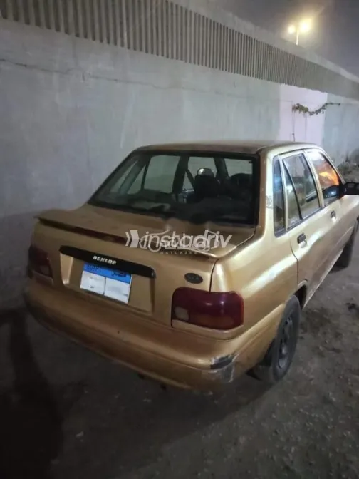 كيا برايد 1999 ذهبي مستعملة للبيع - 1