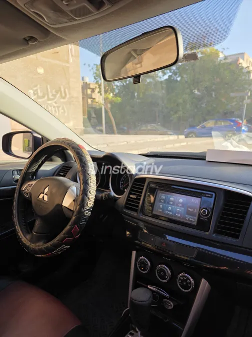 ميتسوبيشي لانسر اى اكس شارك 2018 أبيض مستعملة للبيع - 2