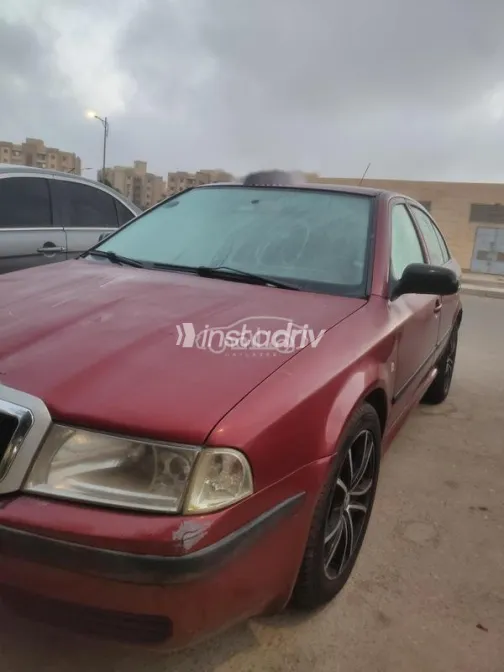 سكودا اوكتافيا A4 2002 أحمر غامق مستعملة للبيع - 4