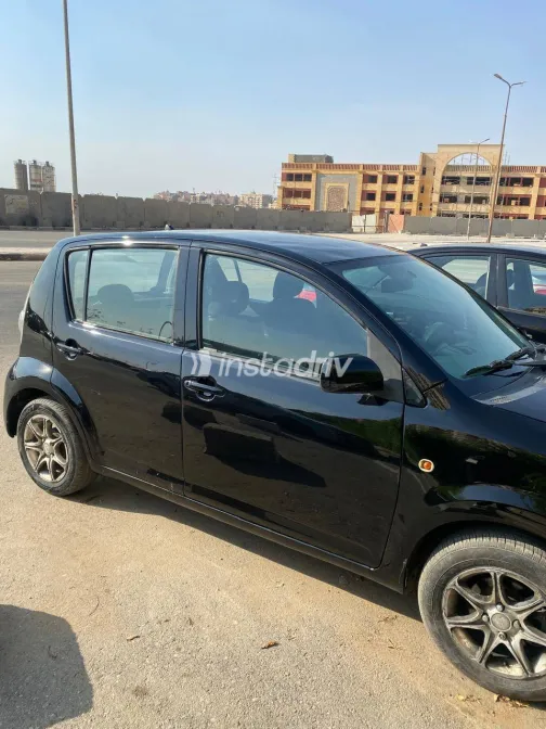 Daihatsu SIRION 2009 White Used for Sale - 1
