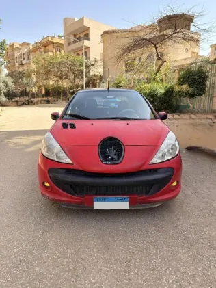 بيجو 206 2011 أحمر مستعملة للبيع
