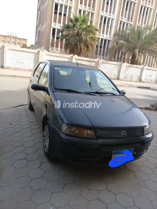 فيات بونتو 2003 أبيض مستعملة للبيع - 7