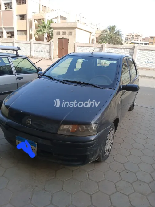 فيات بونتو 2003 أبيض مستعملة للبيع - 8