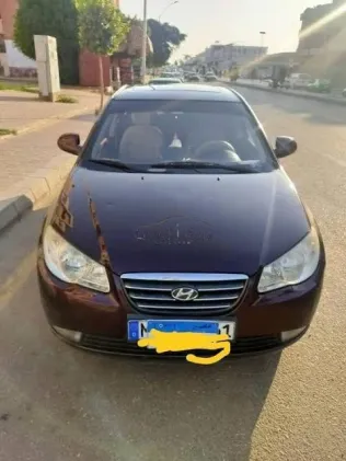 هيونداي إلنترا 2010 باذنجاني مستعملة للبيع