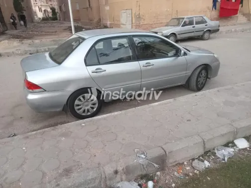 ميتسوبيشي لانسر بومة 2006 فضي مستعملة للبيع - 2