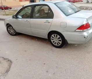 ميتسوبيشي لانسر بومة 2006 فضي مستعملة للبيع