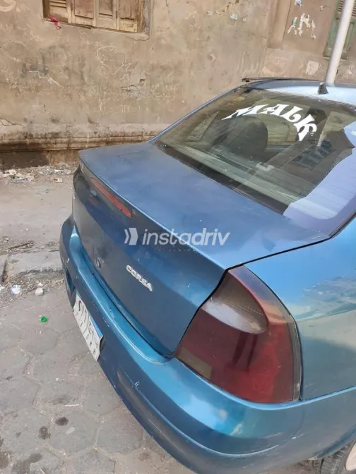 اوبل كورسا 2003 أخضر غامق مستعملة للبيع - 3