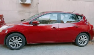 نيسان تيدا 2015 أبيض مستعملة للبيع