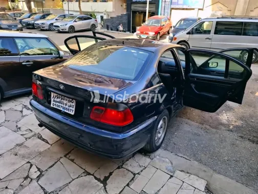 بي ام دبليو 318 2000 أزرق غامق مستعملة للبيع - 7