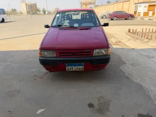 فيات اونو 2001 أحمر مستعملة للبيع