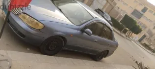 نيسان صنى 2005 أزرق غامق مستعملة للبيع