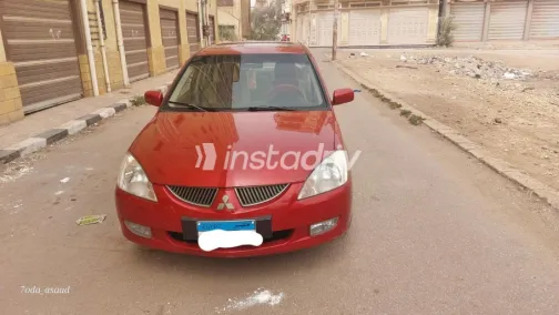 ميتسوبيشي لانسر 2007 أحمر مستعملة للبيع - 1