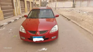 ميتسوبيشي لانسر 2007 أحمر مستعملة للبيع