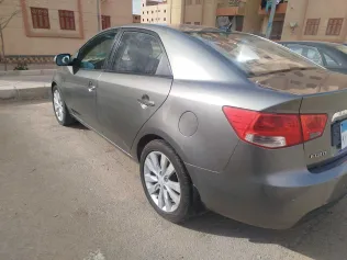 كيا فورتى 2010 رمادي غامق مستعملة للبيع
